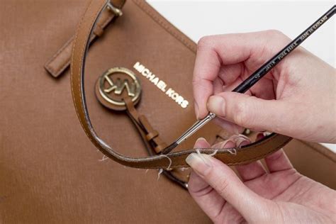 michael kors clasp stuck|Michael Kors leather purse repair.